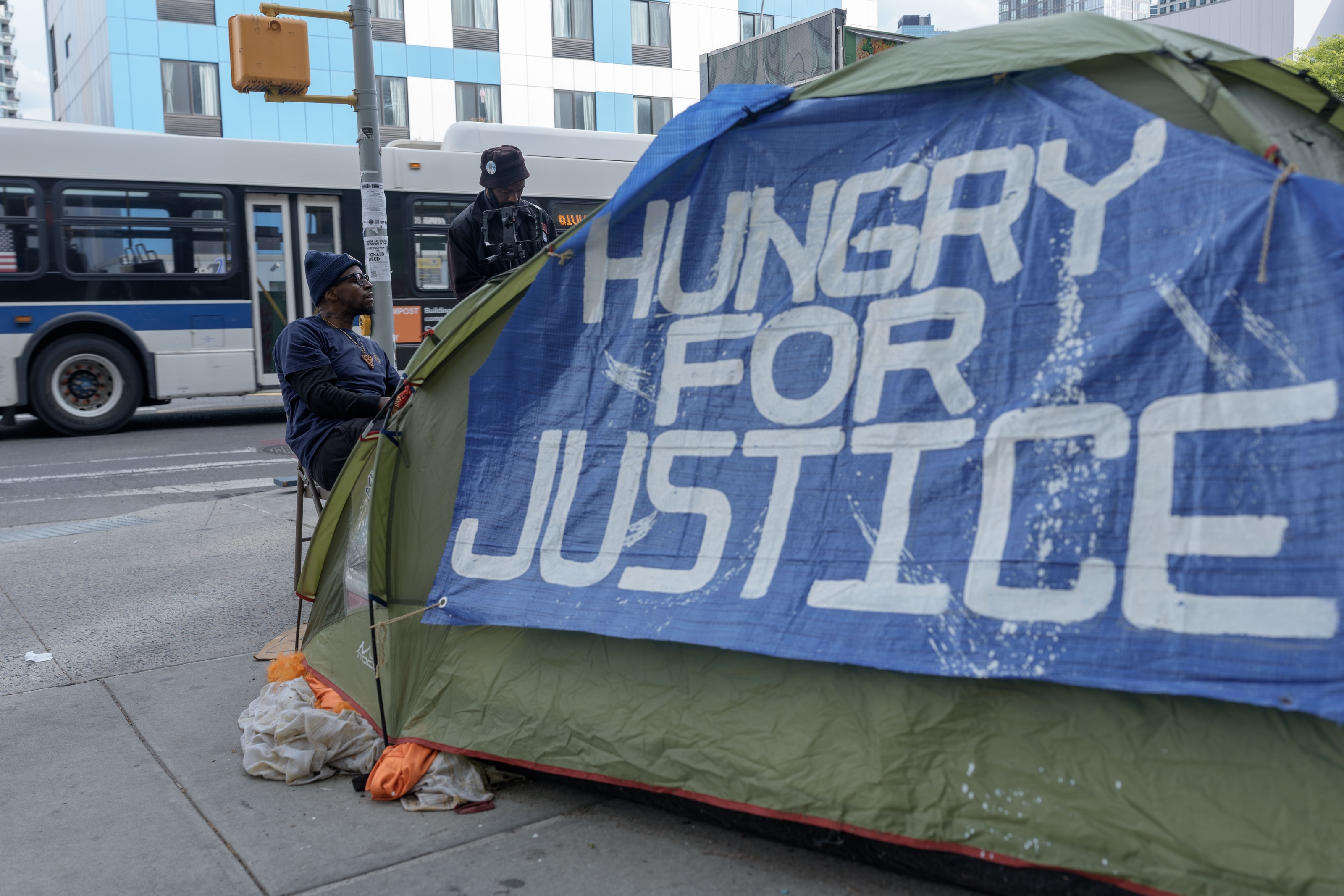 People experiencing homelessness take part in a “Hungry for Justice” hunger strike in Long Island City, calling on New York State to provide greater protection and assistance. The photograph was made on the second day of their hunger strike.